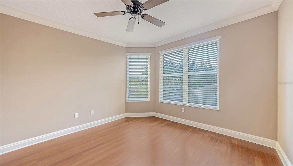 401 North Point Road, Unit 301 Osprey, FL 34229 - Photo 32 of 91 an empty room with a window