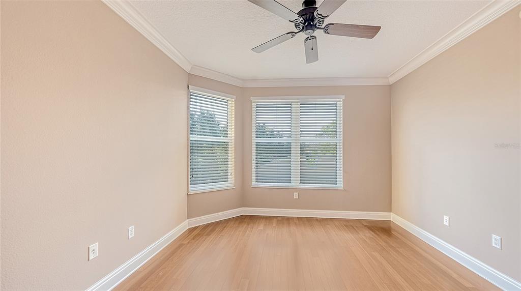 401 North Point Road, Unit 301 Osprey, FL 34229 - Photo 33 of 91 a view of an empty room with a window