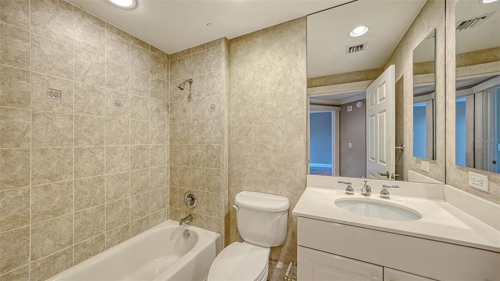 401 North Point Road, Unit 301 Osprey, FL 34229 - Photo 35 of 91 a bathroom with a sink toilet and shower