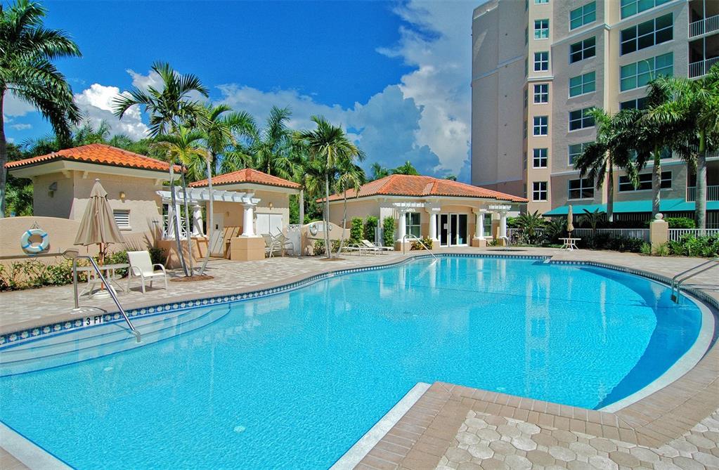 401 North Point Road, Unit 301 Osprey, FL 34229 - Photo 45 of 91 a view of a swimming pool with a patio