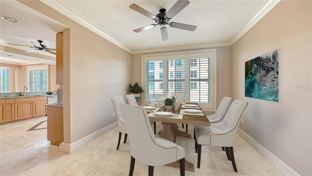 401 North Point Road, Unit 301 Osprey, FL 34229 - Photo 7 of 91 a view of a dining room with furniture window and outside view