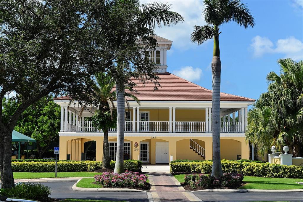 401 North Point Road, Unit 301 Osprey, FL 34229 - Photo 85 of 91 front view of a house with a yard