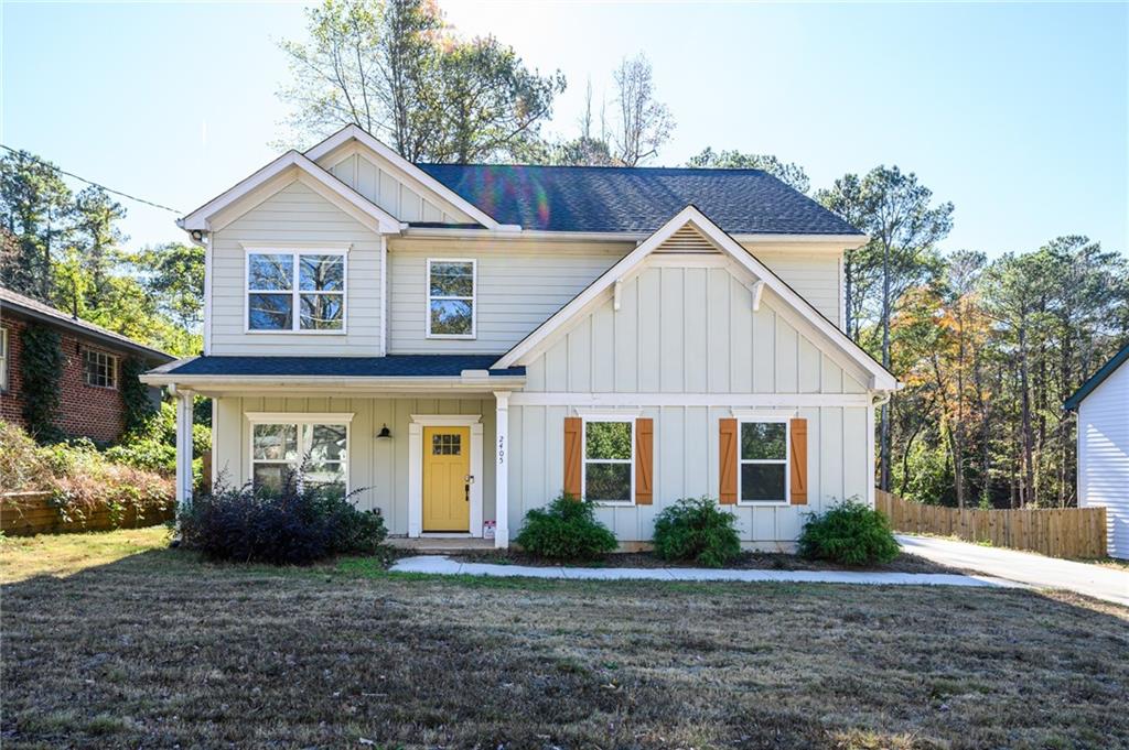 2405 McAfee Road Decatur, GA 30032 - Photo 1 of 1 a view of a house with a yard plants and large tree