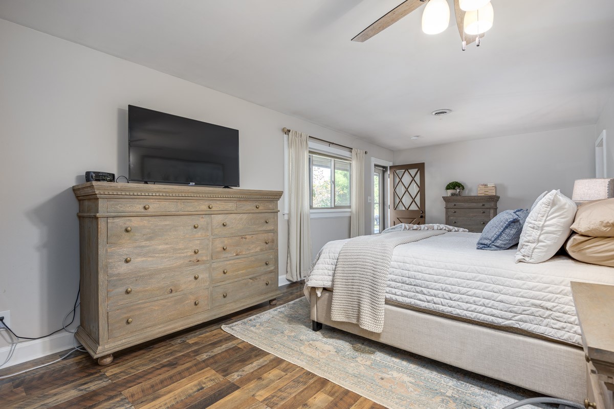 6923 Cross Keys Road College Grove, TN 37046 - Photo 17 of 67 a bedroom with a bed and flat screen tv