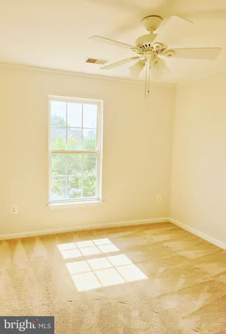 a view of a room with a window