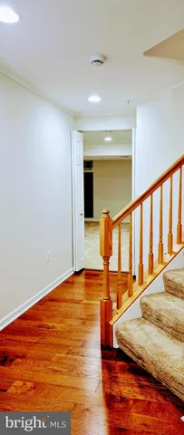 a view of swimming pool with a chair