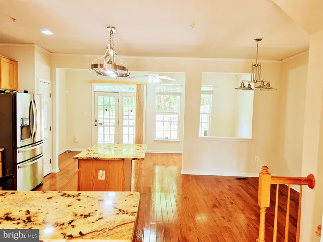 a bathroom with a tub sink and shower