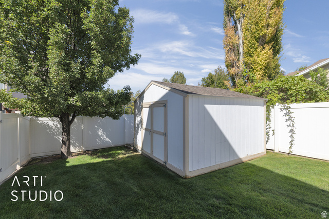 704 West Vahe Street Draper, UT 84020 - Photo 28 of 35 Detached storage shed with a shingled roof and double doors