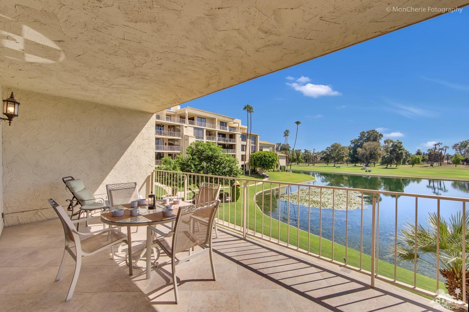 910 Island Drive, Unit 211 Rancho Mirage, CA 92270 - Photo 1 of 38 a view of a chairs and table in the balcony