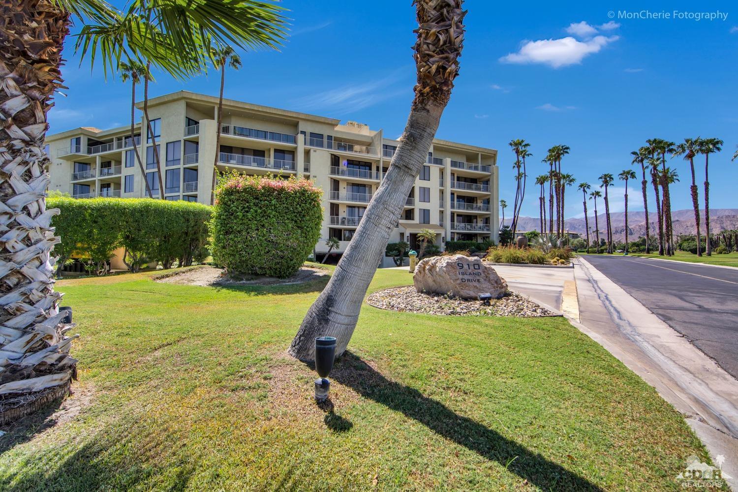 910 Island Drive, Unit 211 Rancho Mirage, CA 92270 - Photo 8 of 38 a view of a house with backyard porch and sitting area
