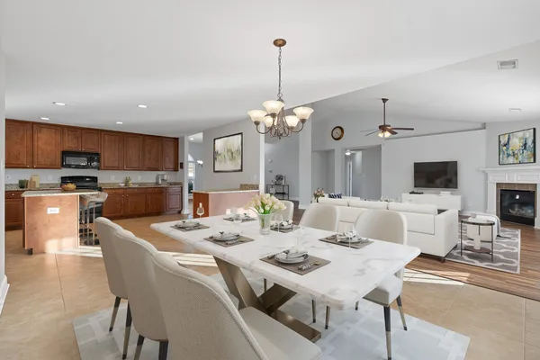 a view of a dining room with furniture