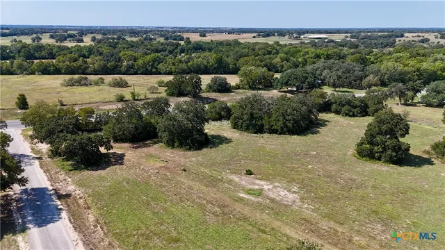 a view of a bunch of trees and houses