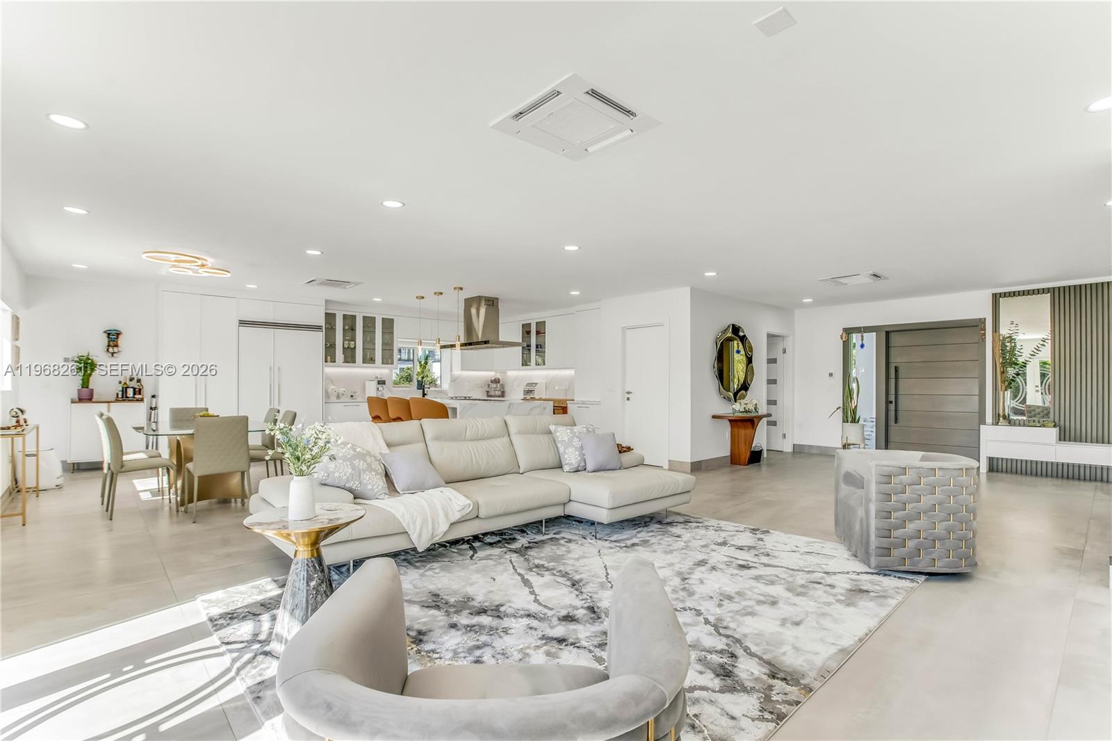 500 94th Street Surfside, FL 33154 - Photo 14 of 47 a living room with furniture and a couch