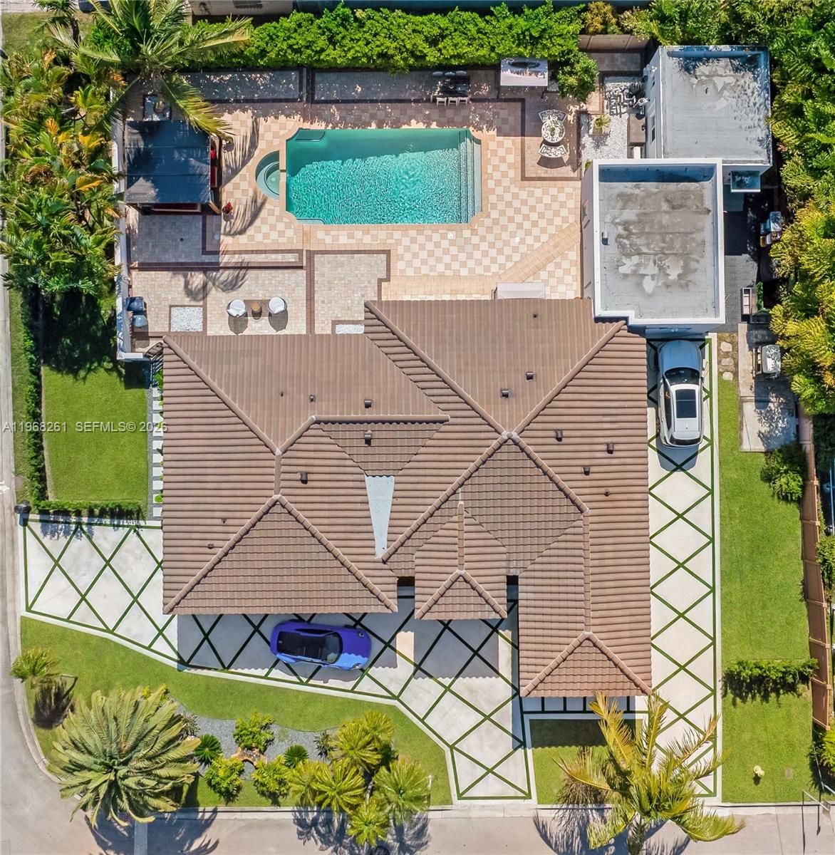 500 94th Street Surfside, FL 33154 - Photo 3 of 47 an aerial view of a house with a yard