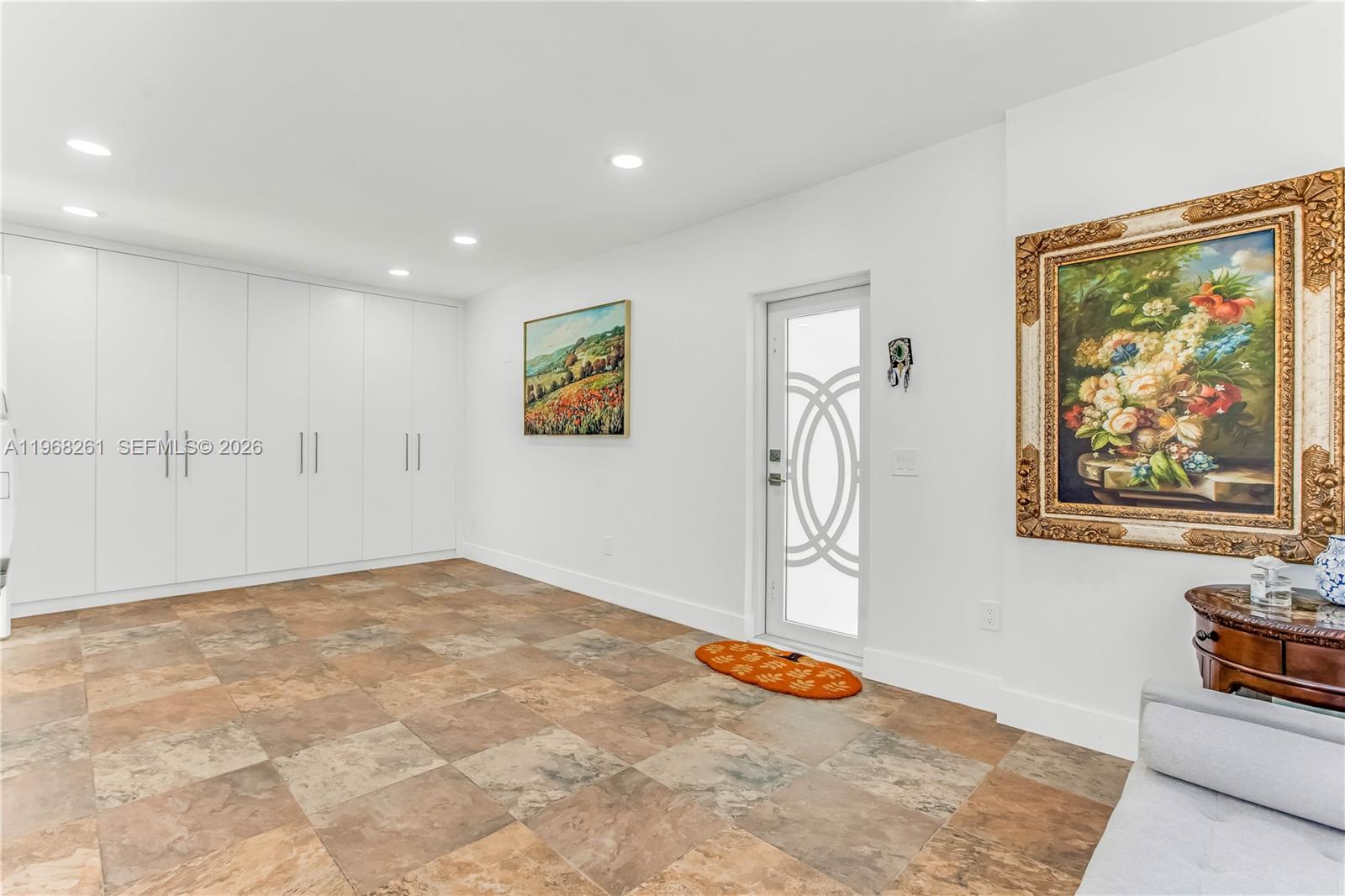 500 94th Street Surfside, FL 33154 - Photo 42 of 47 a view of a big room with painting on the wall