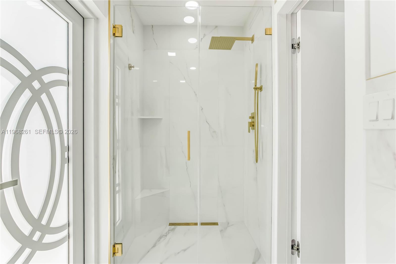 500 94th Street Surfside, FL 33154 - Photo 44 of 47 a view of a bathroom with a shower