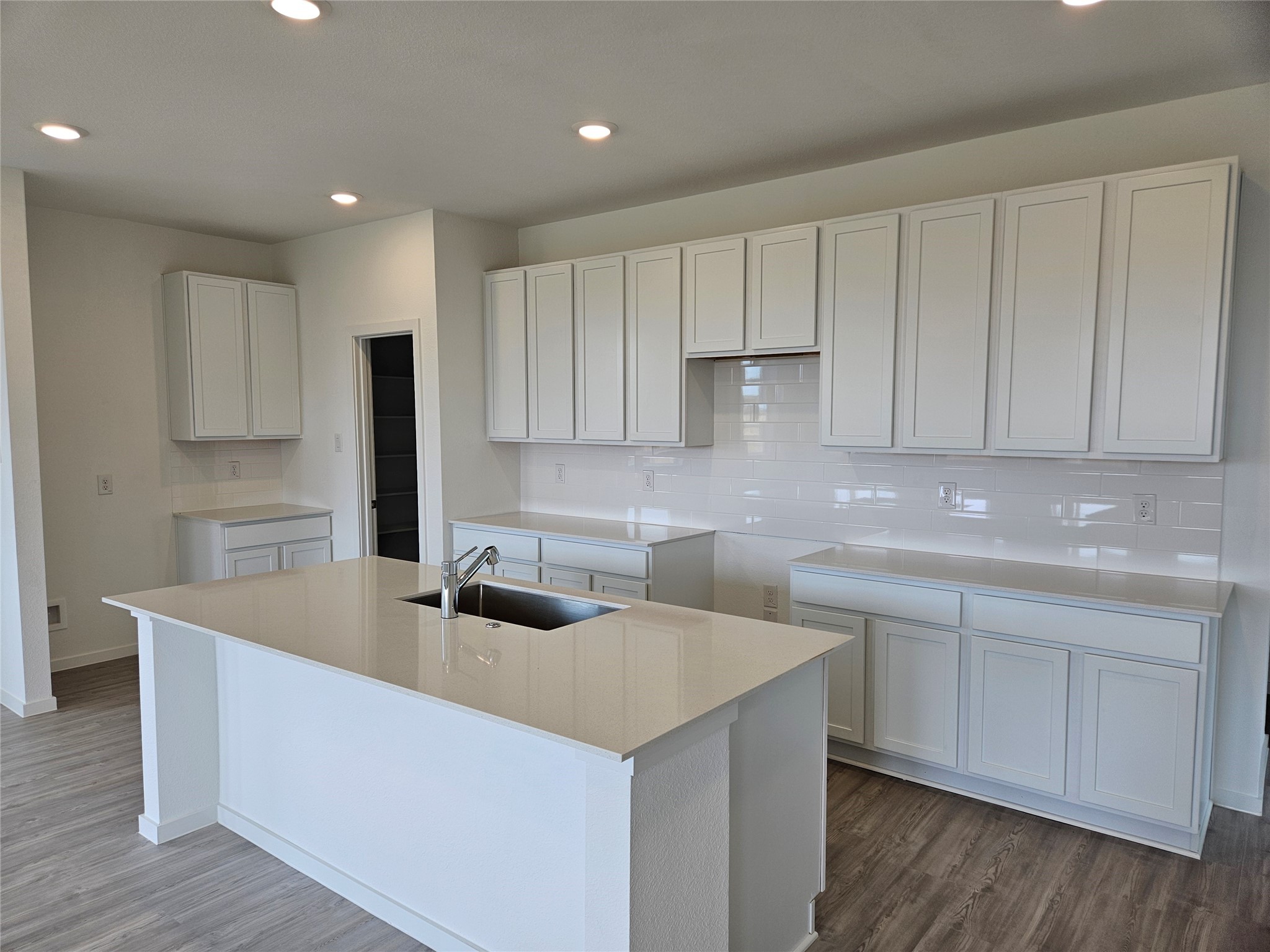 2510 Ruby Copper Drive Rosharon, TX 77583 - Photo 1 of 11 a kitchen with cabinets a sink and dishwasher