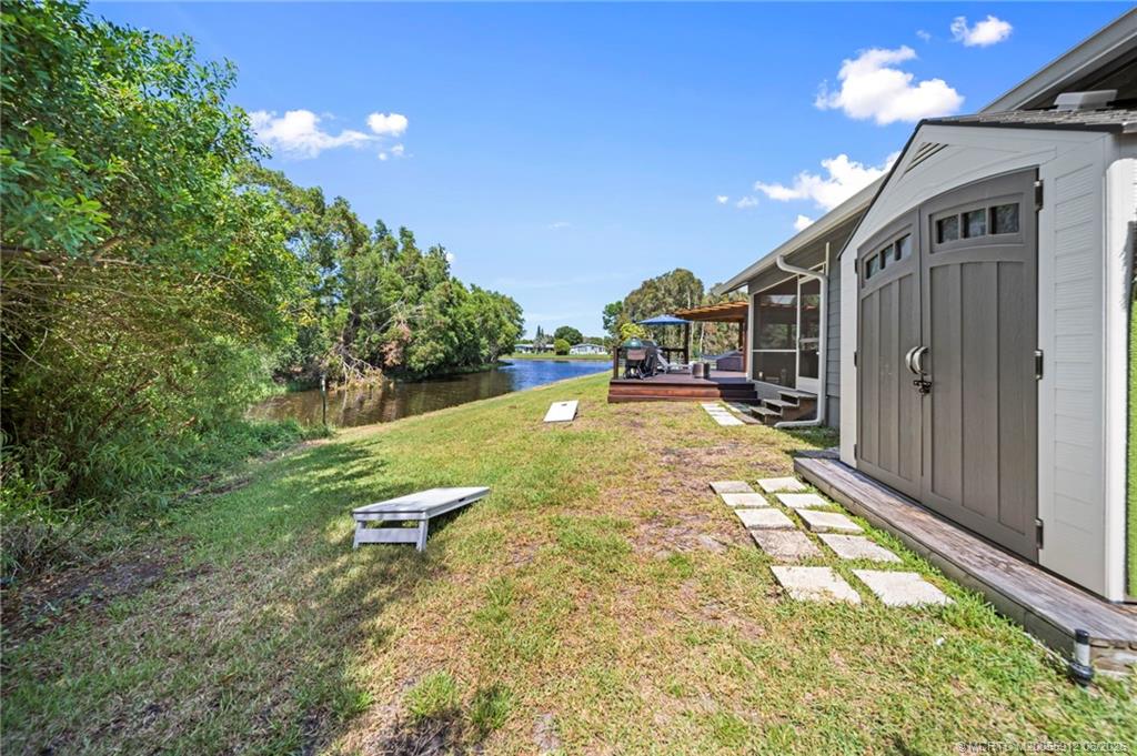 4401 Southeast Satinleaf Place Stuart, FL 34997 - Photo 41 of 51 Side Yard and Shed