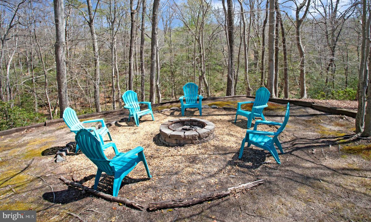 54 Simmons Ridge Road Prince Frederick, MD 20678 - Photo 48 of 55 a view of a backyard with sitting area
