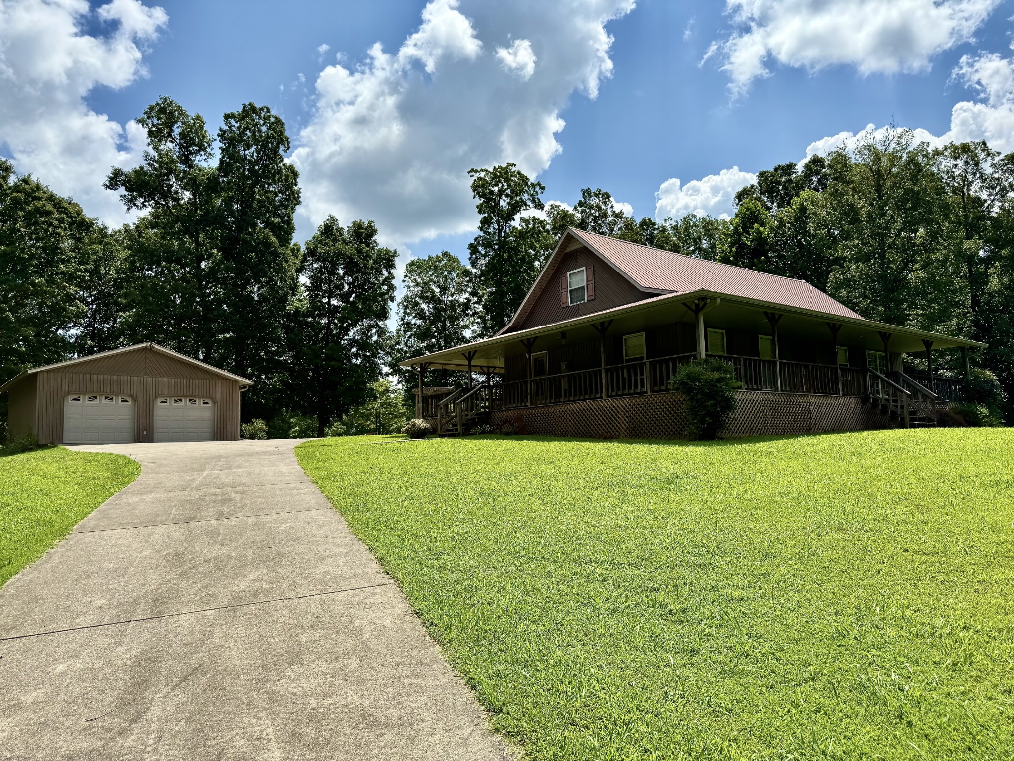 1086 Brown Mill Road McEwen, TN 37101 - Photo 12 of 44 a front view of a house with a yard