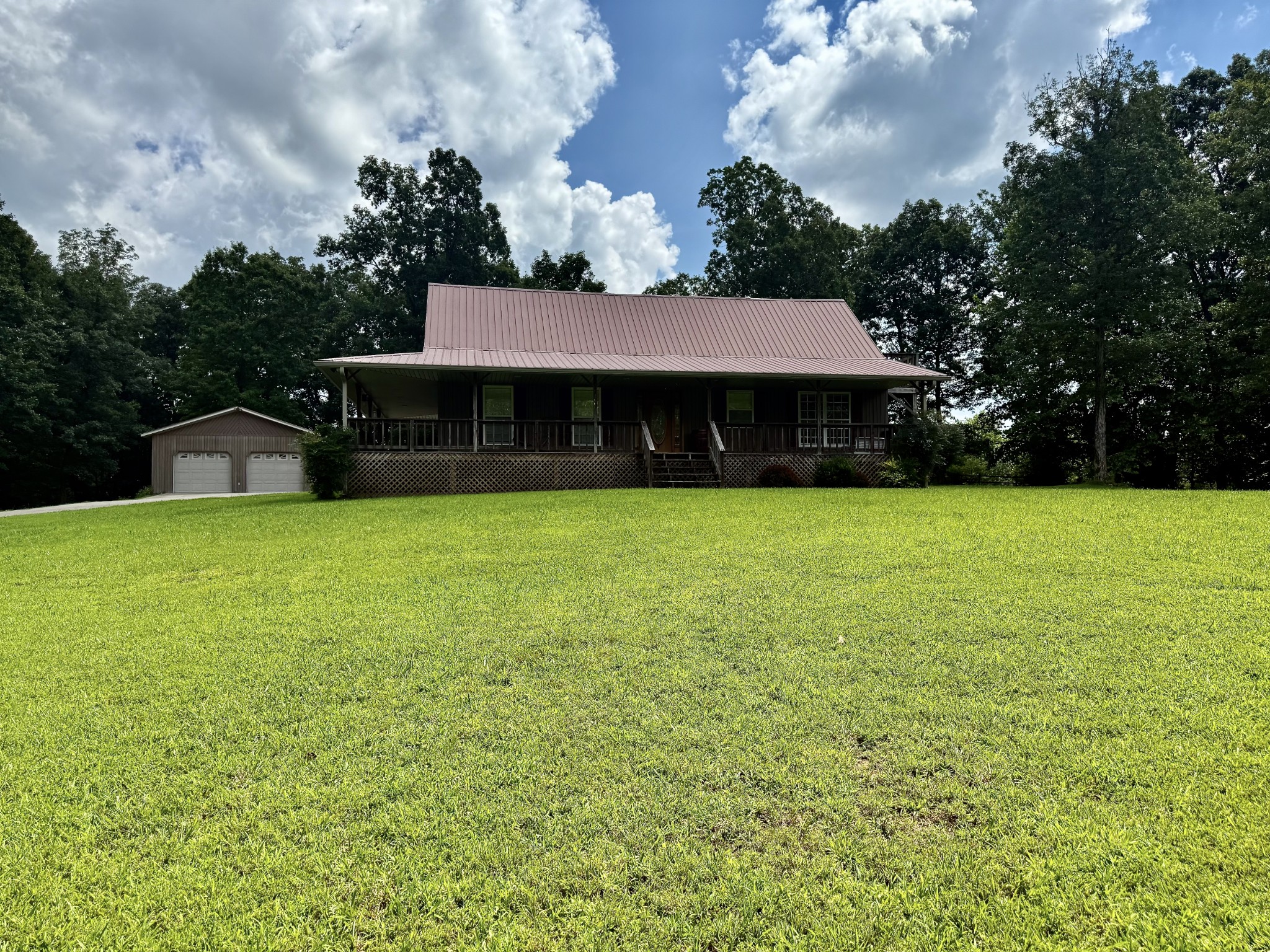1086 Brown Mill Road McEwen, TN 37101 - Photo 2 of 44 a view of a house with a yard
