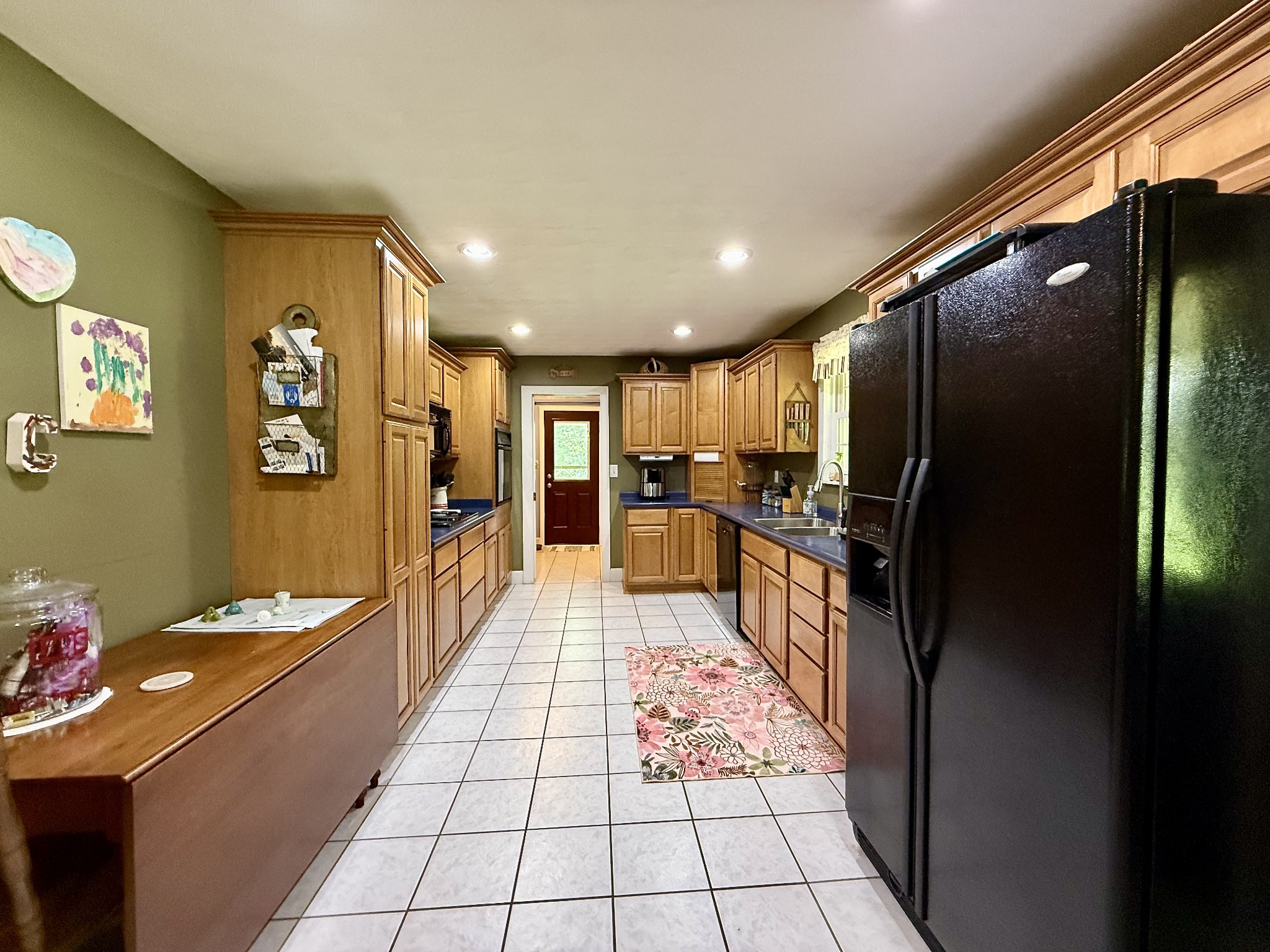 1086 Brown Mill Road McEwen, TN 37101 - Photo 22 of 44 a long hallway with furniture and a large window
