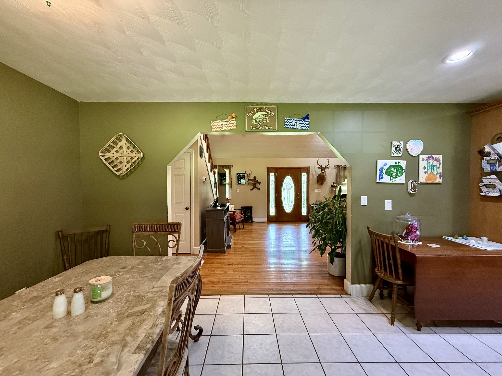 1086 Brown Mill Road McEwen, TN 37101 - Photo 24 of 44 a lobby with a table and chairs