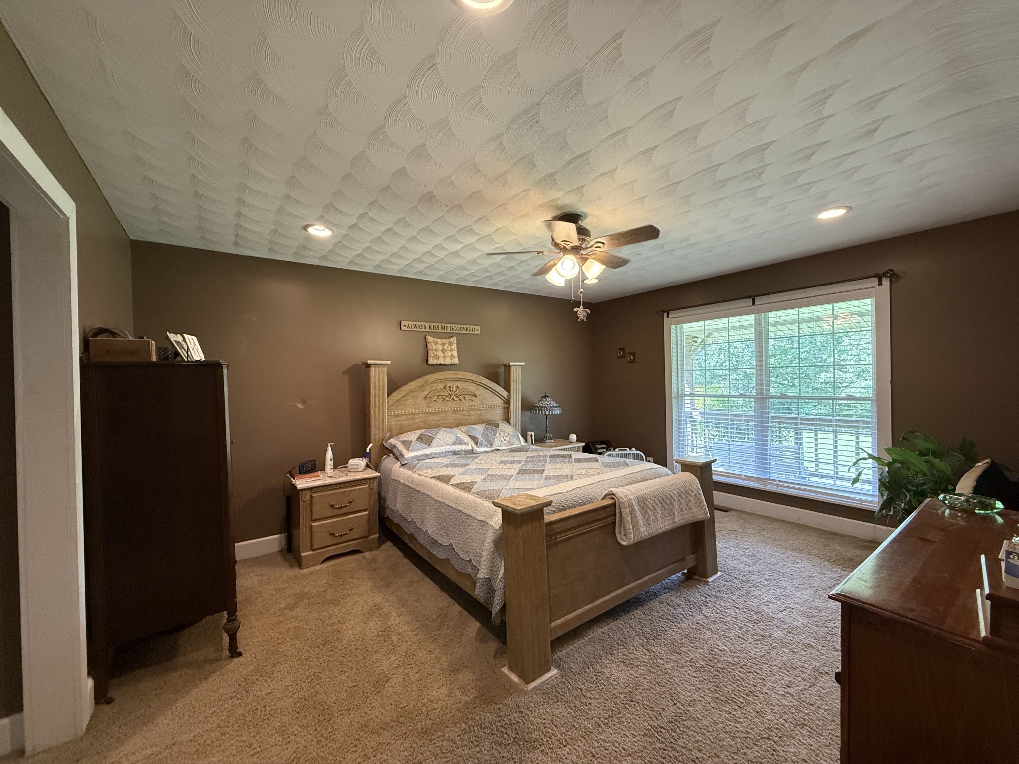 1086 Brown Mill Road McEwen, TN 37101 - Photo 29 of 44 a spacious bedroom with a bed and a large window