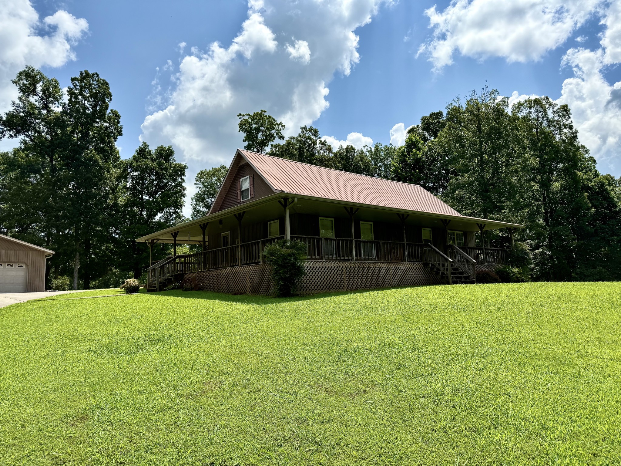 1086 Brown Mill Road McEwen, TN 37101 - Photo 3 of 44 a front view of a house with yard and green space