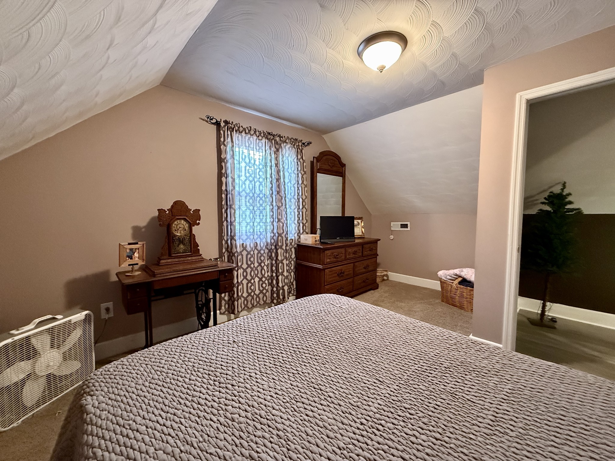 1086 Brown Mill Road McEwen, TN 37101 - Photo 35 of 44 a bedroom with a bed and a dresser next to it