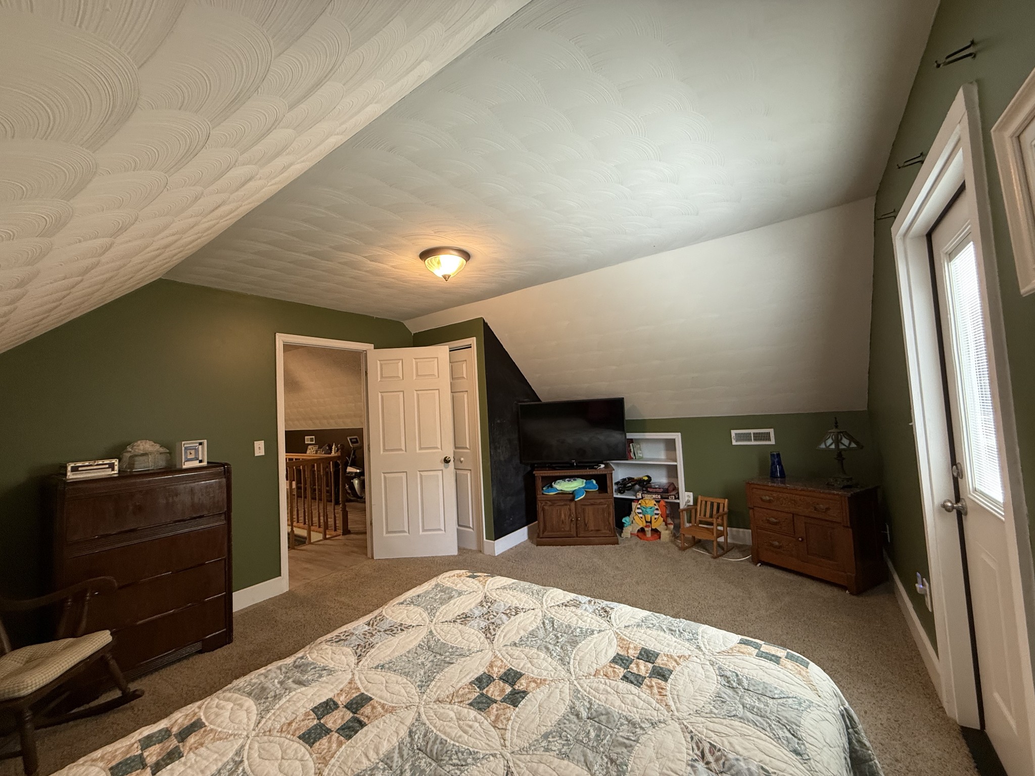 1086 Brown Mill Road McEwen, TN 37101 - Photo 39 of 44 a bed room with furniture and a flat tv screen