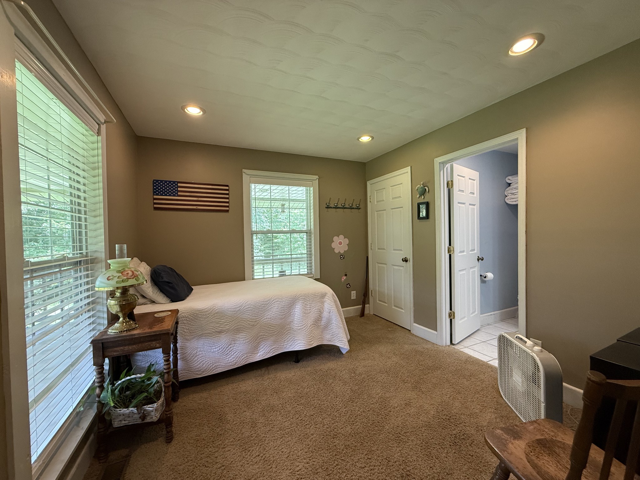 1086 Brown Mill Road McEwen, TN 37101 - Photo 40 of 44 a bedroom with a bed and a window