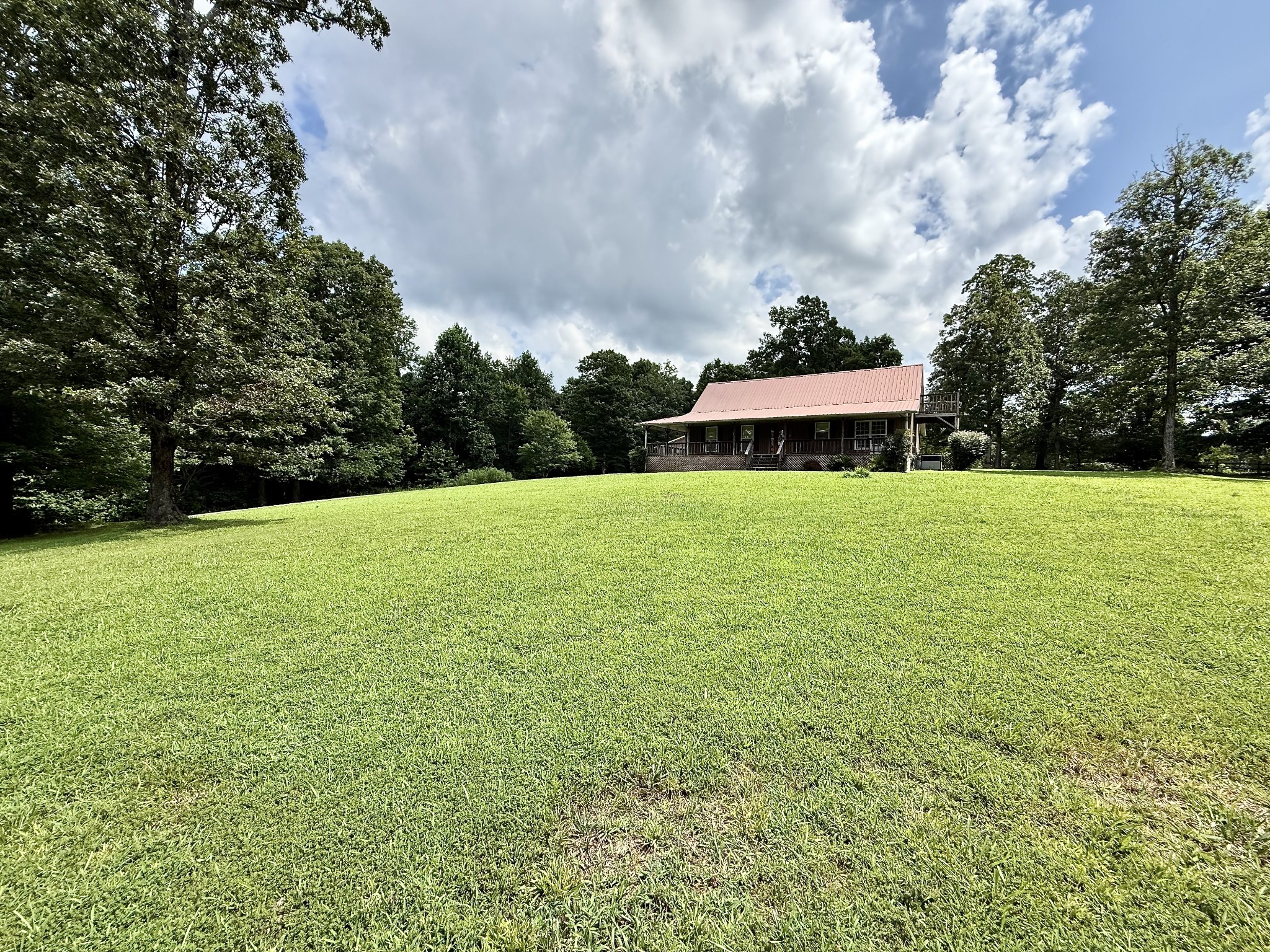 1086 Brown Mill Road McEwen, TN 37101 - Photo 10 of 44 a view of a garden with a house