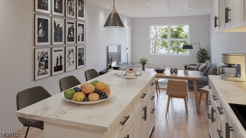 29 Frederick Street, Unit 2 Belleville, NJ 07109 - Photo 3 of 6 a view of a dining room with furniture and wooden floor