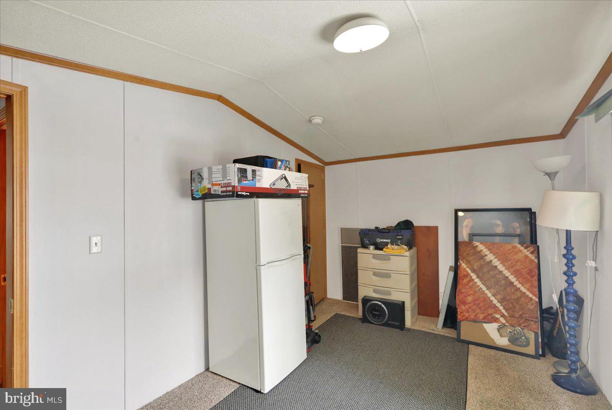 125 Tuckerton Road, Unit 916 Reading, PA 19605 - Photo 11 of 19 a view of a livingroom with furniture and a hallway