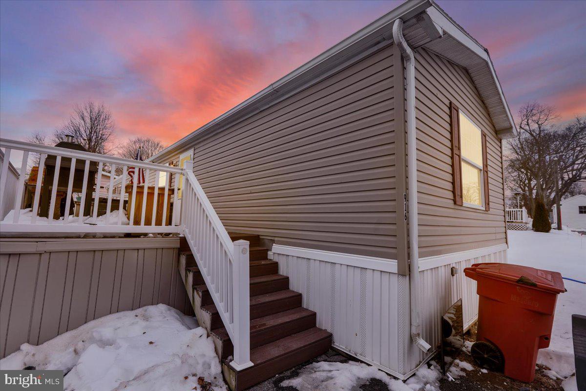 125 Tuckerton Road, Unit 916 Reading, PA 19605 - Photo 4 of 19 a view of backyard with deck and wooden floor