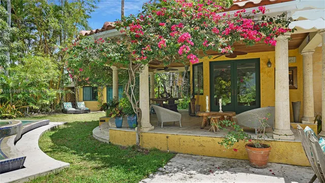 a view of a swimming pool with a lounge chairs