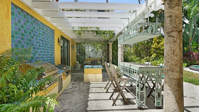 a bathroom with a granite countertop sink a mirror and a vanity