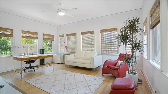 a living room with furniture and a window