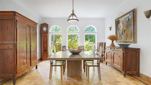 a living room with furniture bathtub and a large window