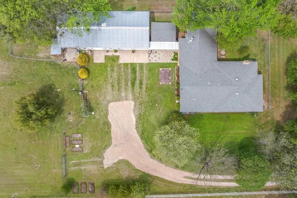 a view of a garden with an outdoor space