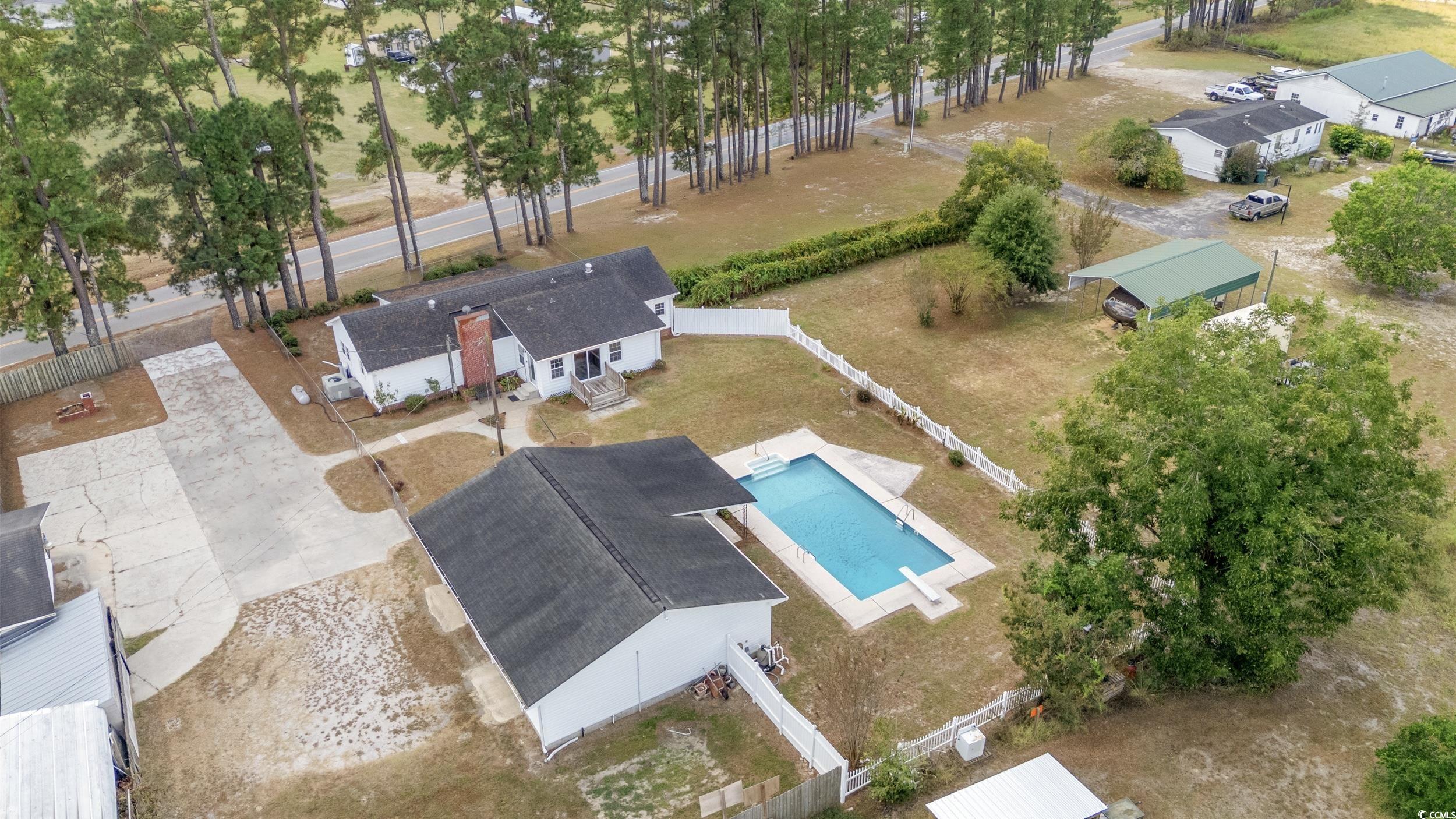 4422 Grady Road Mullins, SC 29574 - Photo 28 of 28 View from above of property with a pool area
