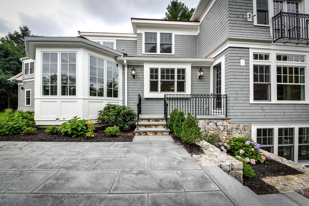 19 Falmouth Road Wellesley, MA 02481 - Photo 16 of 29 a front view of a house with garden