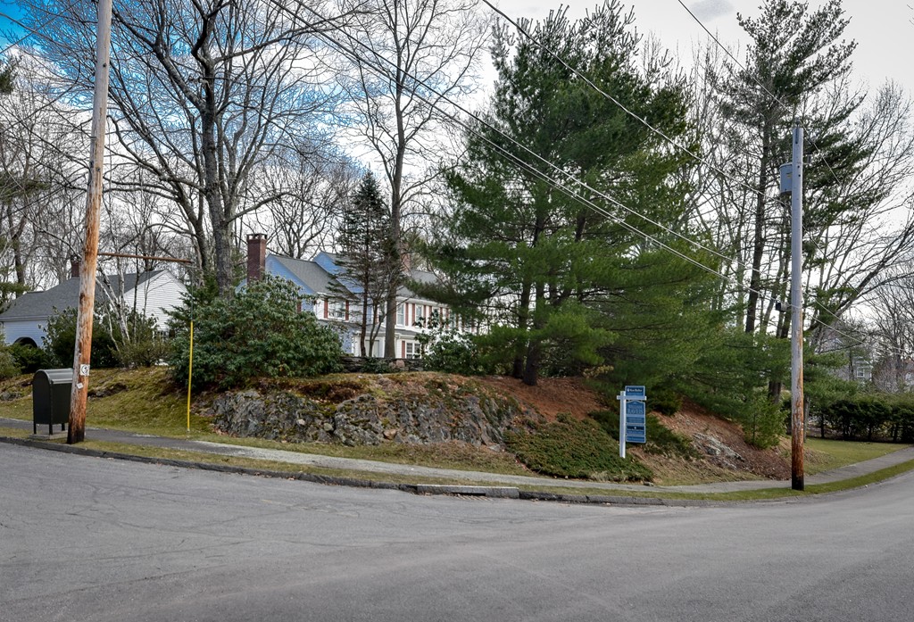 19 Falmouth Road Wellesley, MA 02481 - Photo 18 of 29 a sign board with a house