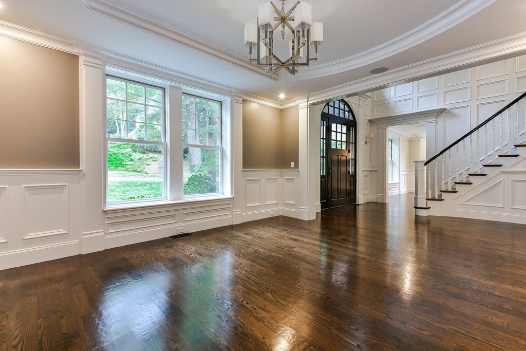 19 Falmouth Road Wellesley, MA 02481 - Photo 5 of 29 a view of a room with wooden floors and chandelier