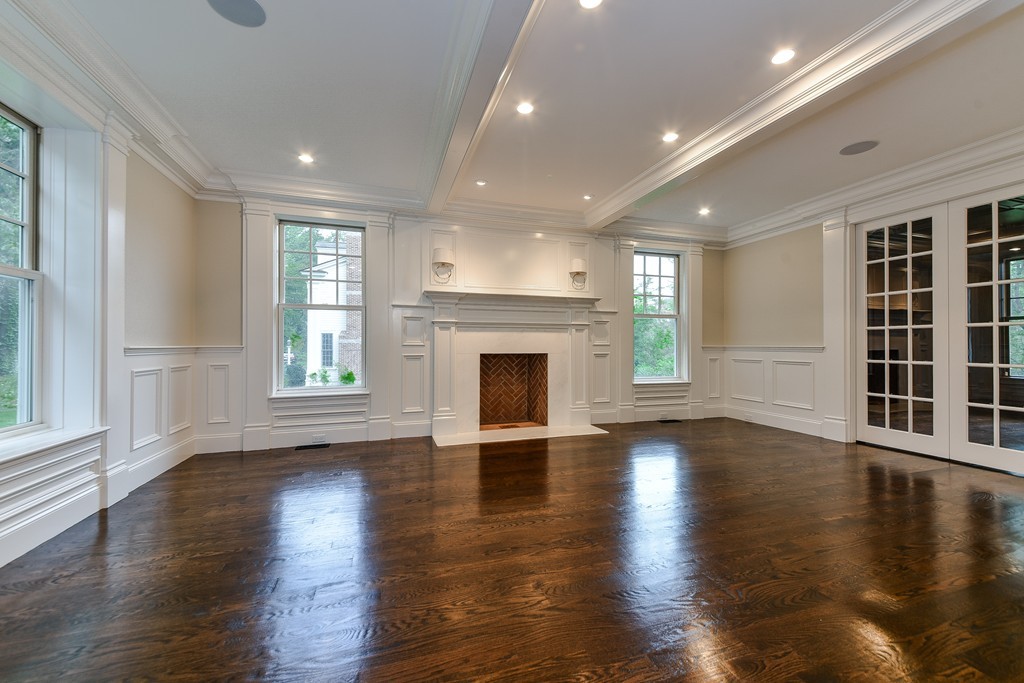 19 Falmouth Road Wellesley, MA 02481 - Photo 6 of 29 an empty room with wooden floor and a window