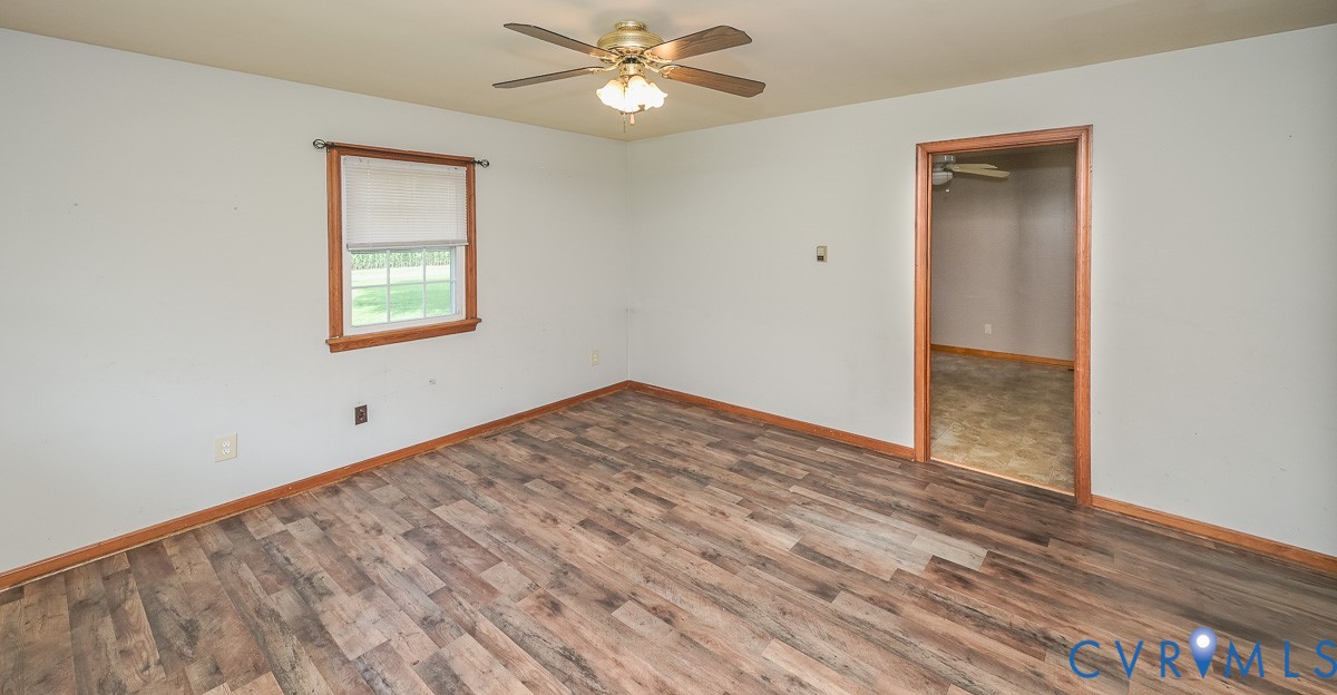 581 Smokey Road Aylett, VA 23009 - Photo 8 of 28 Room featuring wood-finish flooring, a ceiling fan