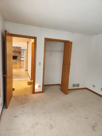 a bathroom with a sink vanity granite and a toilet