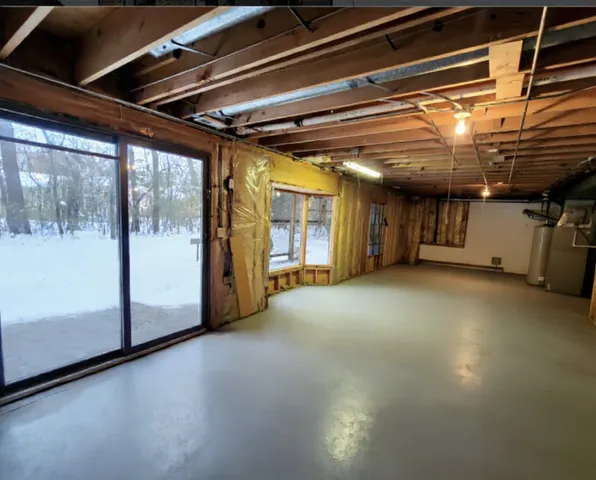 a view of snow on the side of the road