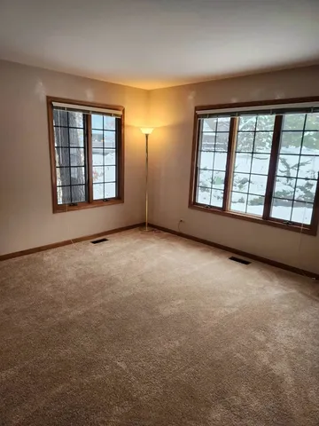 an empty room with windows